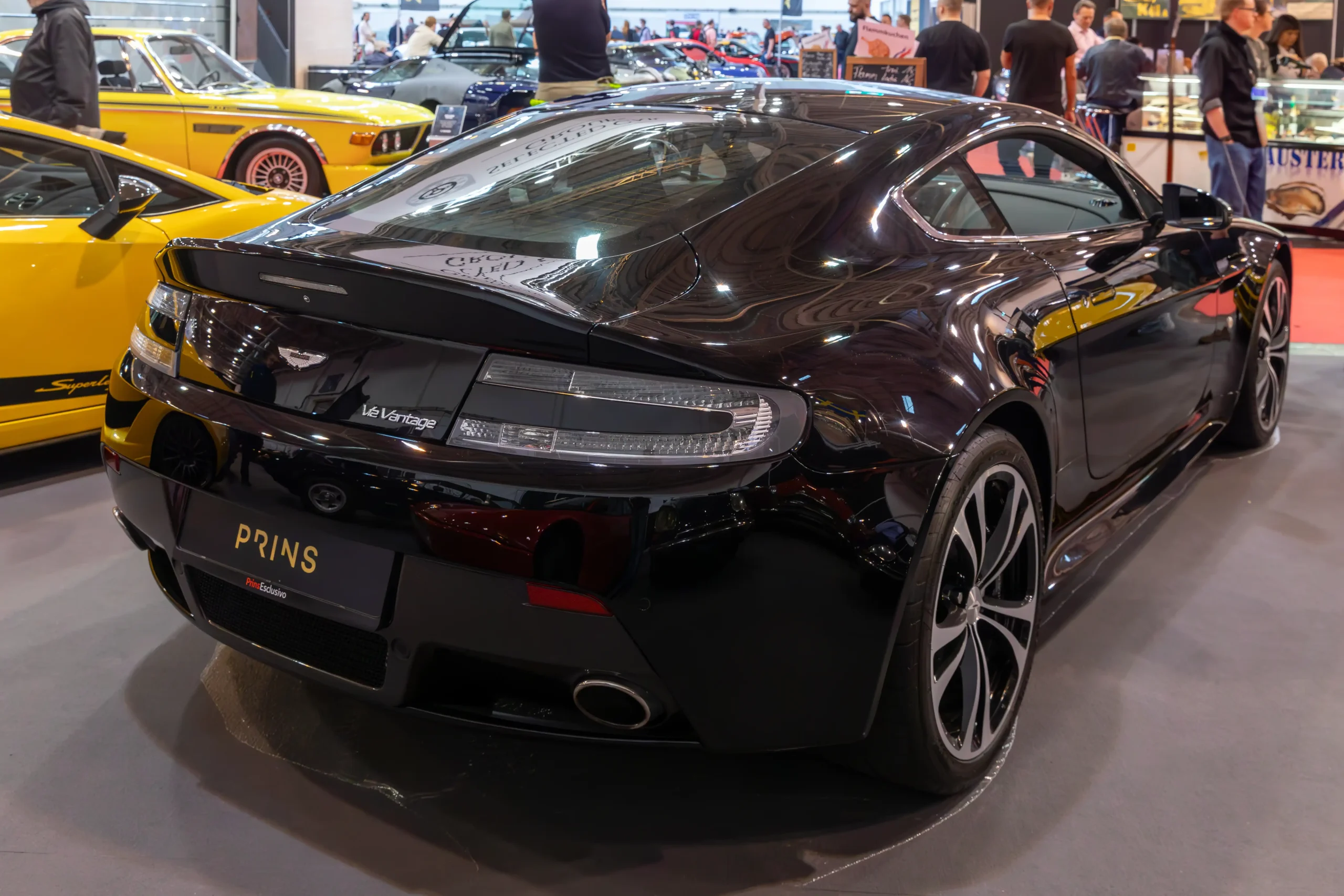 Sleek Aston Martin V12 Vantage, powerful sports car in motion