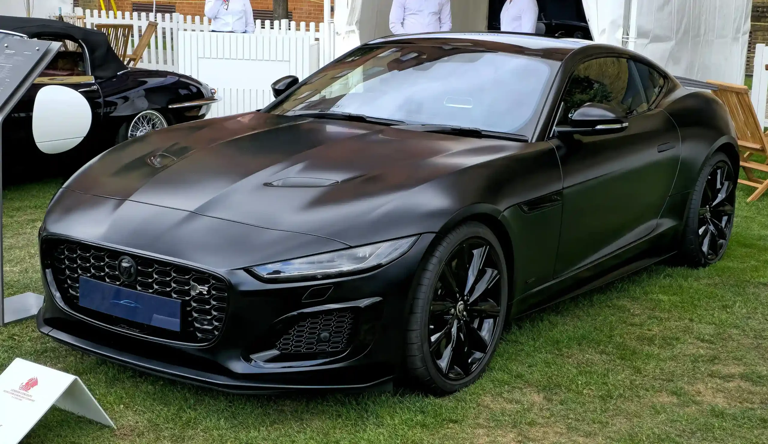 Sleek silver Jaguar F-Type R, powerful sports car, luxury and speed.