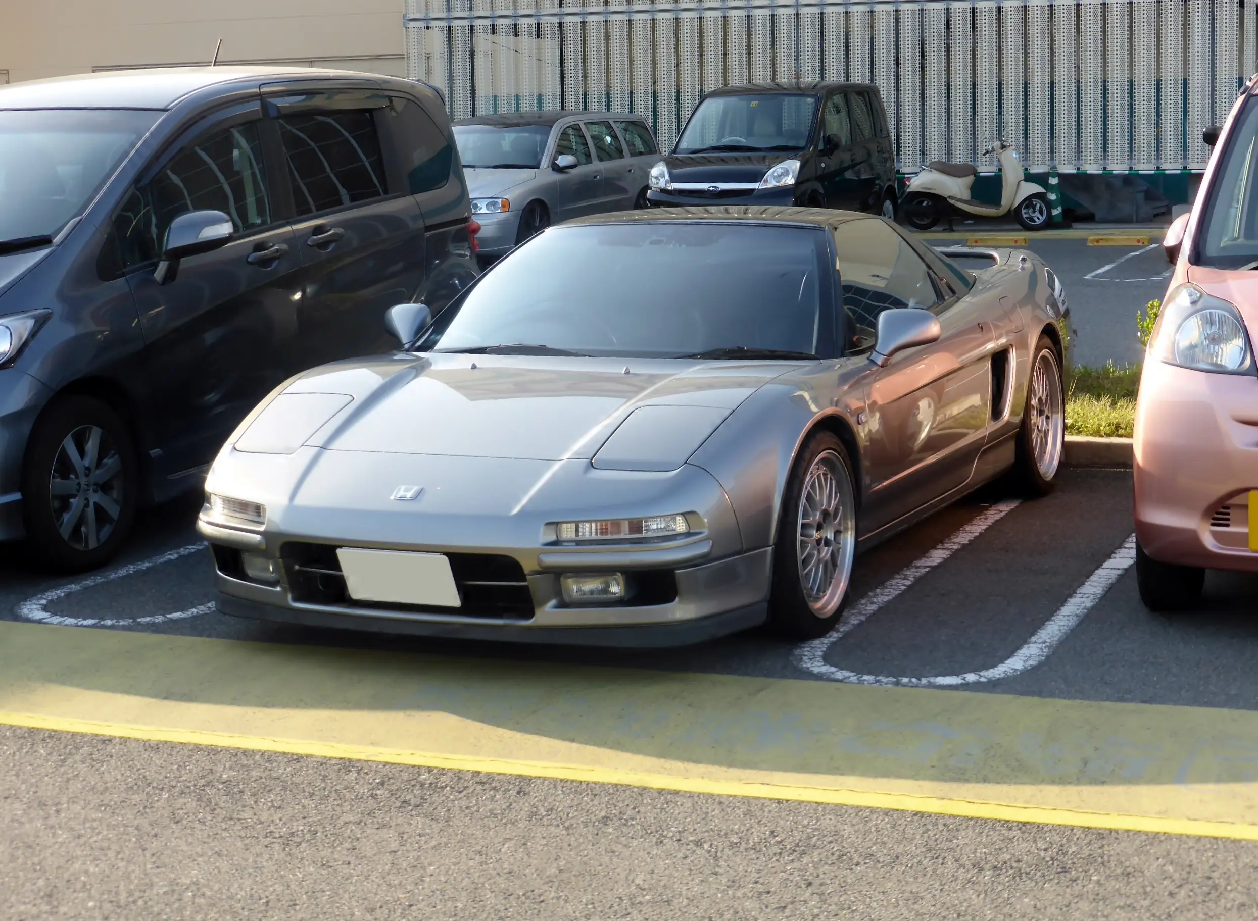 Front view of a classic Honda NSX (NA1) sports car.