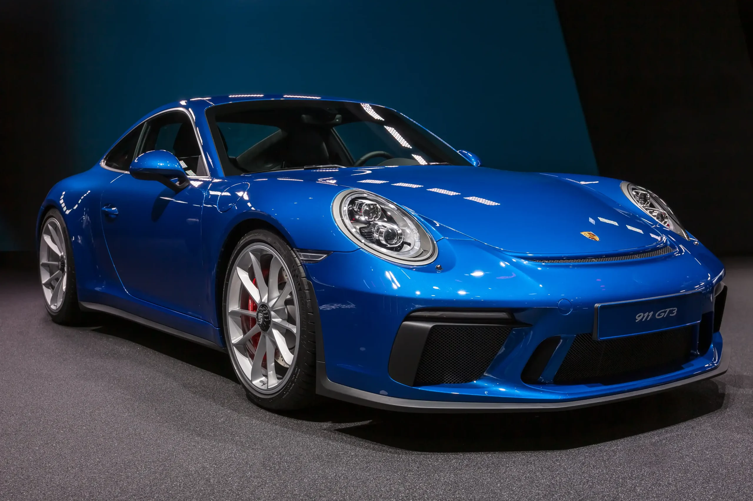 Sleek, high-performance Porsche 911 GT3 sports car, ready to race.