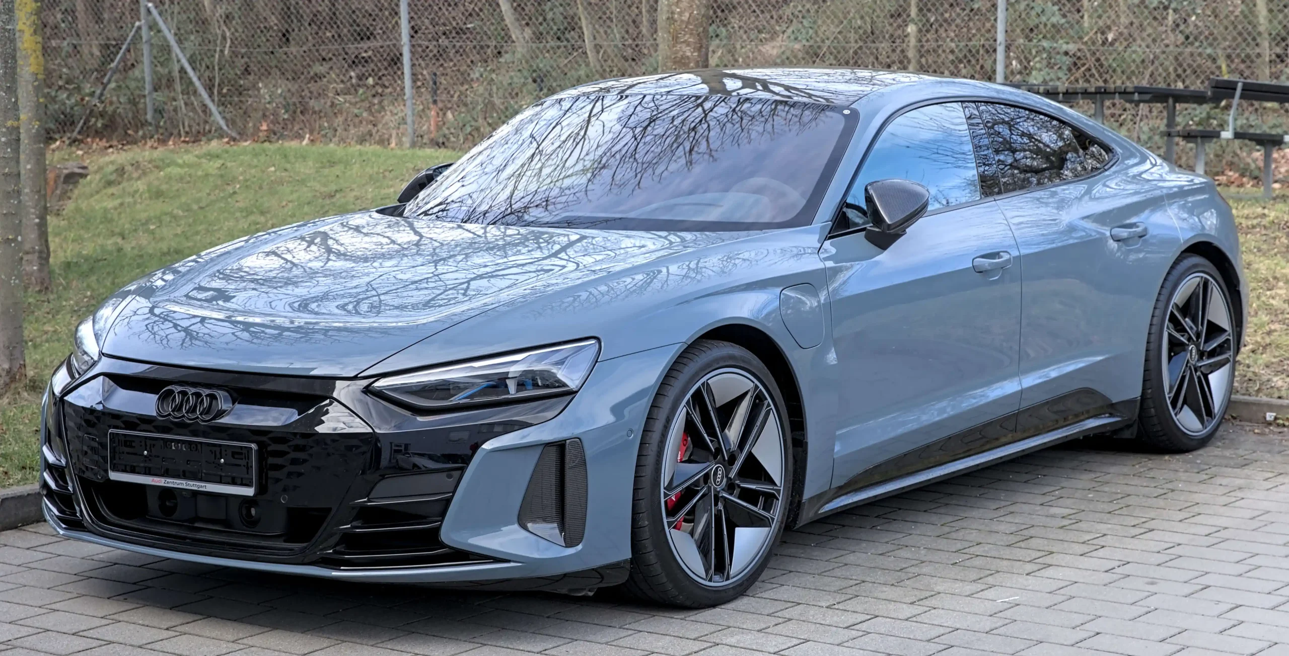 Sleek silver Audi RS e-tron GT, showcasing electric luxury performance