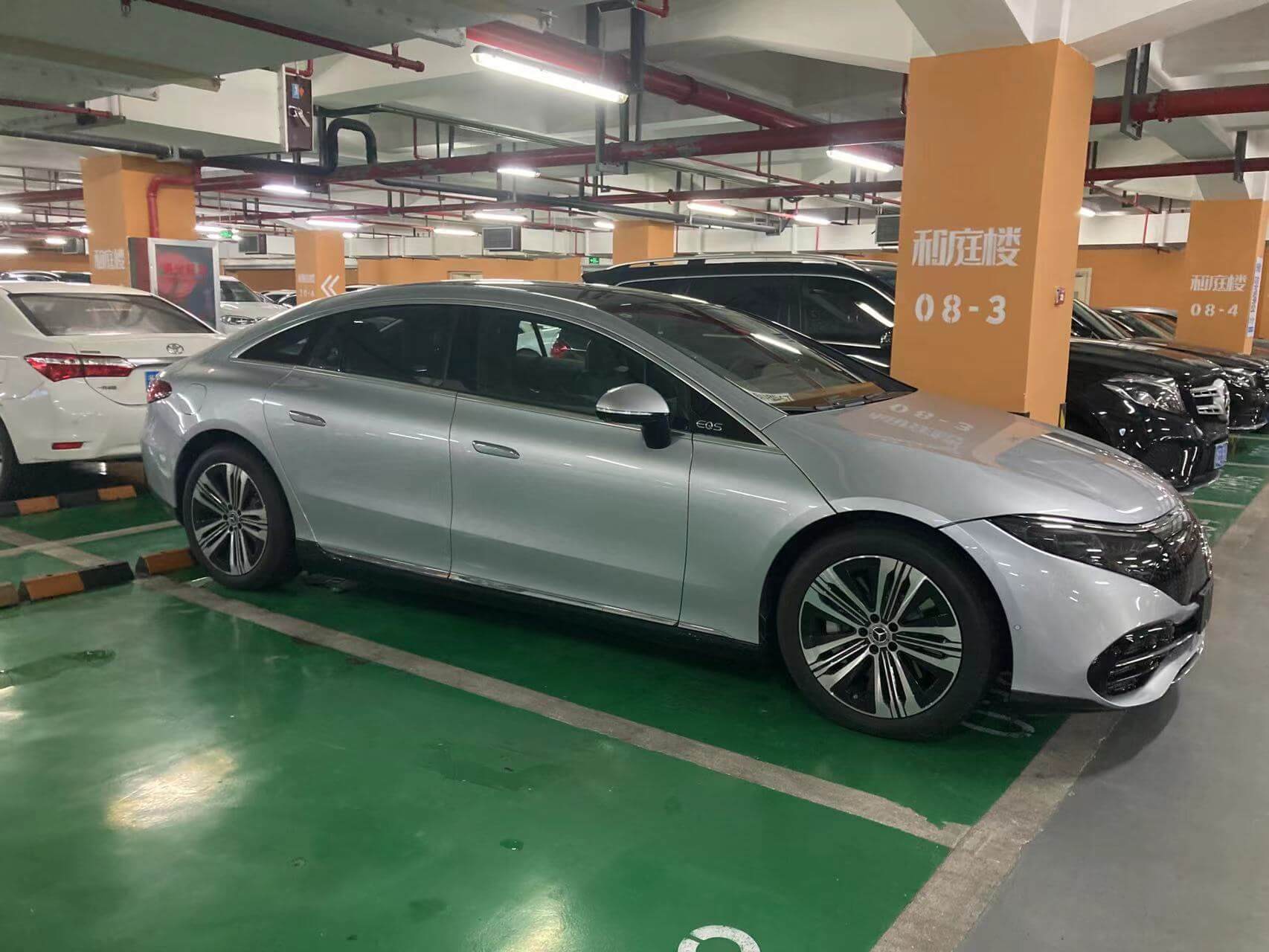 Sleek Mercedes-Benz EQS electric car, showcasing luxury and innovation.