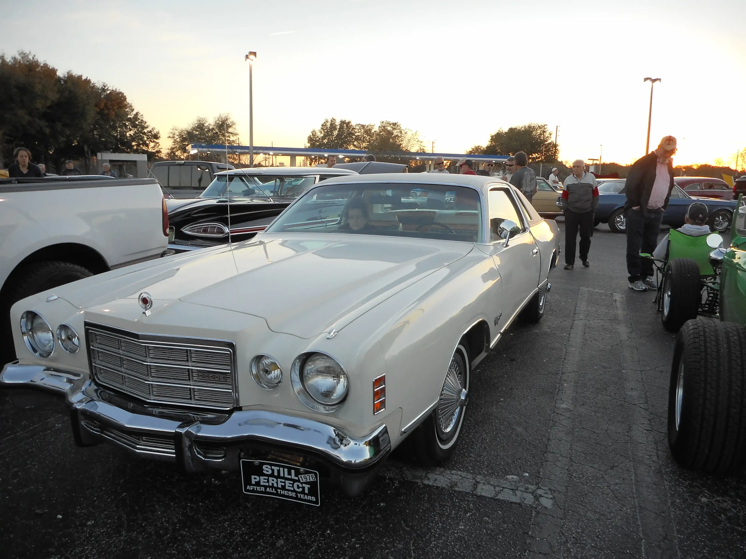 Sleek 1976 Dodge Charger SE, vintage muscle car, silver paint.