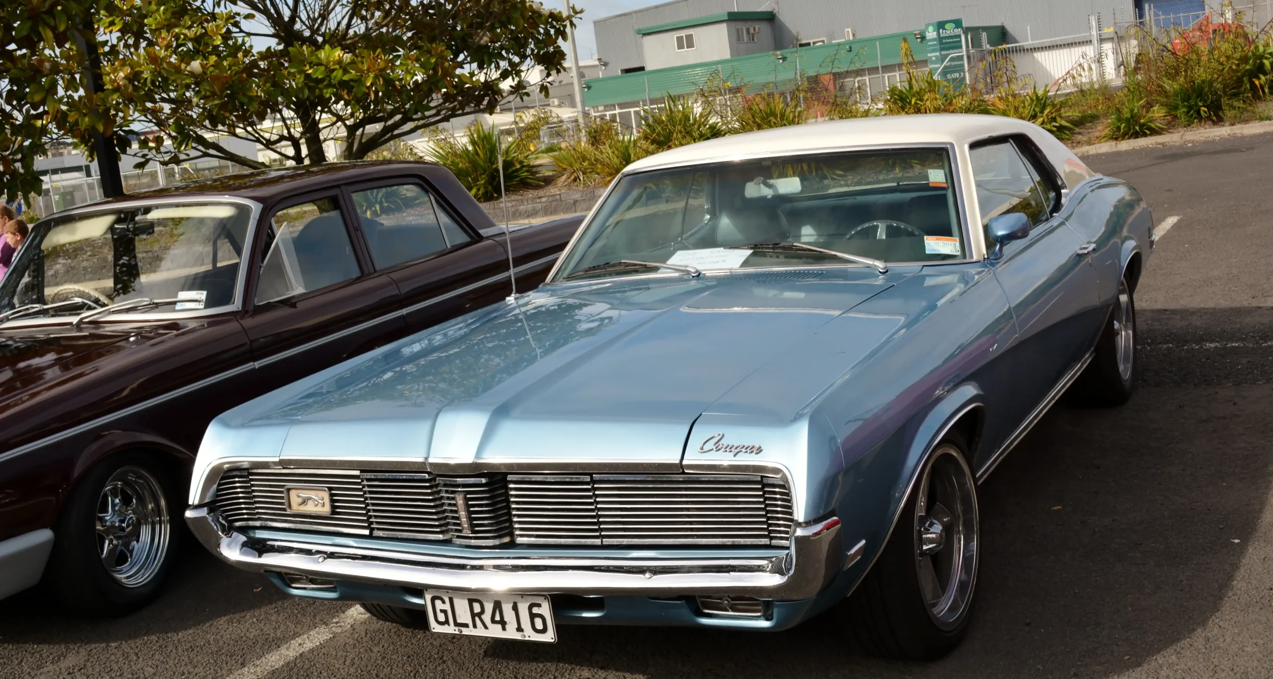 Classic 1969 Mercury Cougar muscle car, sleek lines, powerful engine.