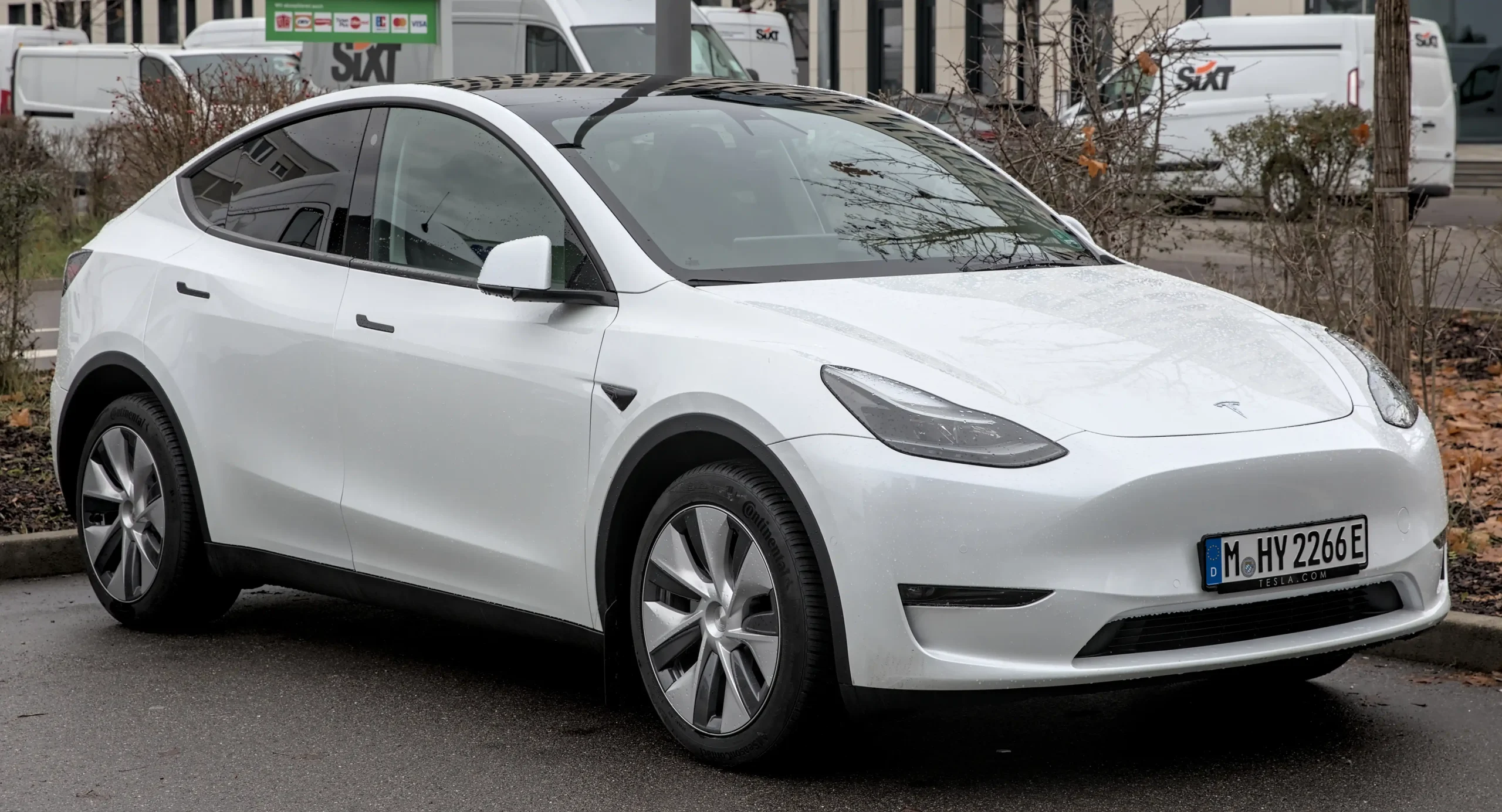 Tesla Model Y parked, showcasing its sleek, modern electric SUV design.