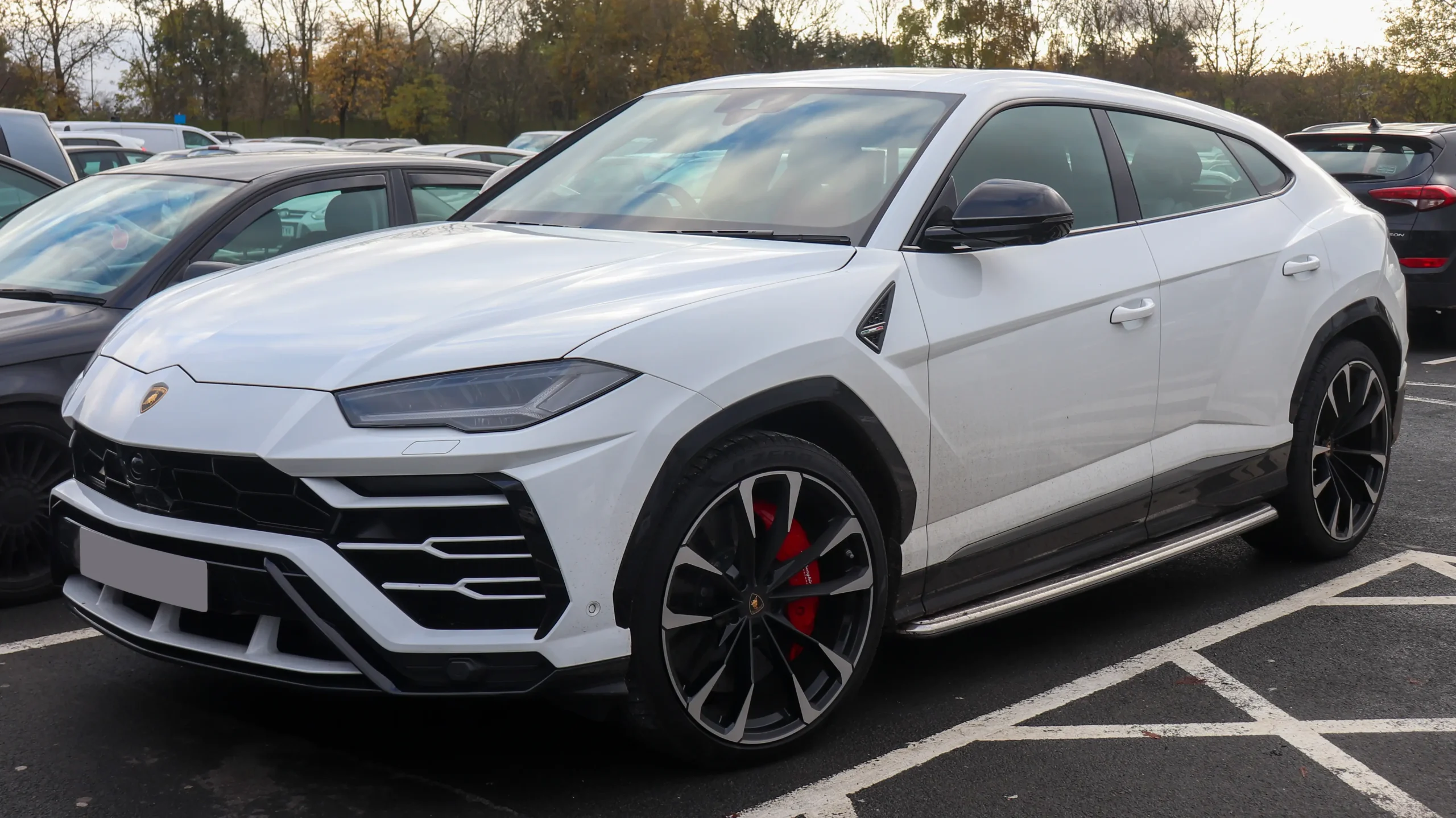 Luxury Lamborghini Urus V8, parked, showcasing its powerful SUV design.
