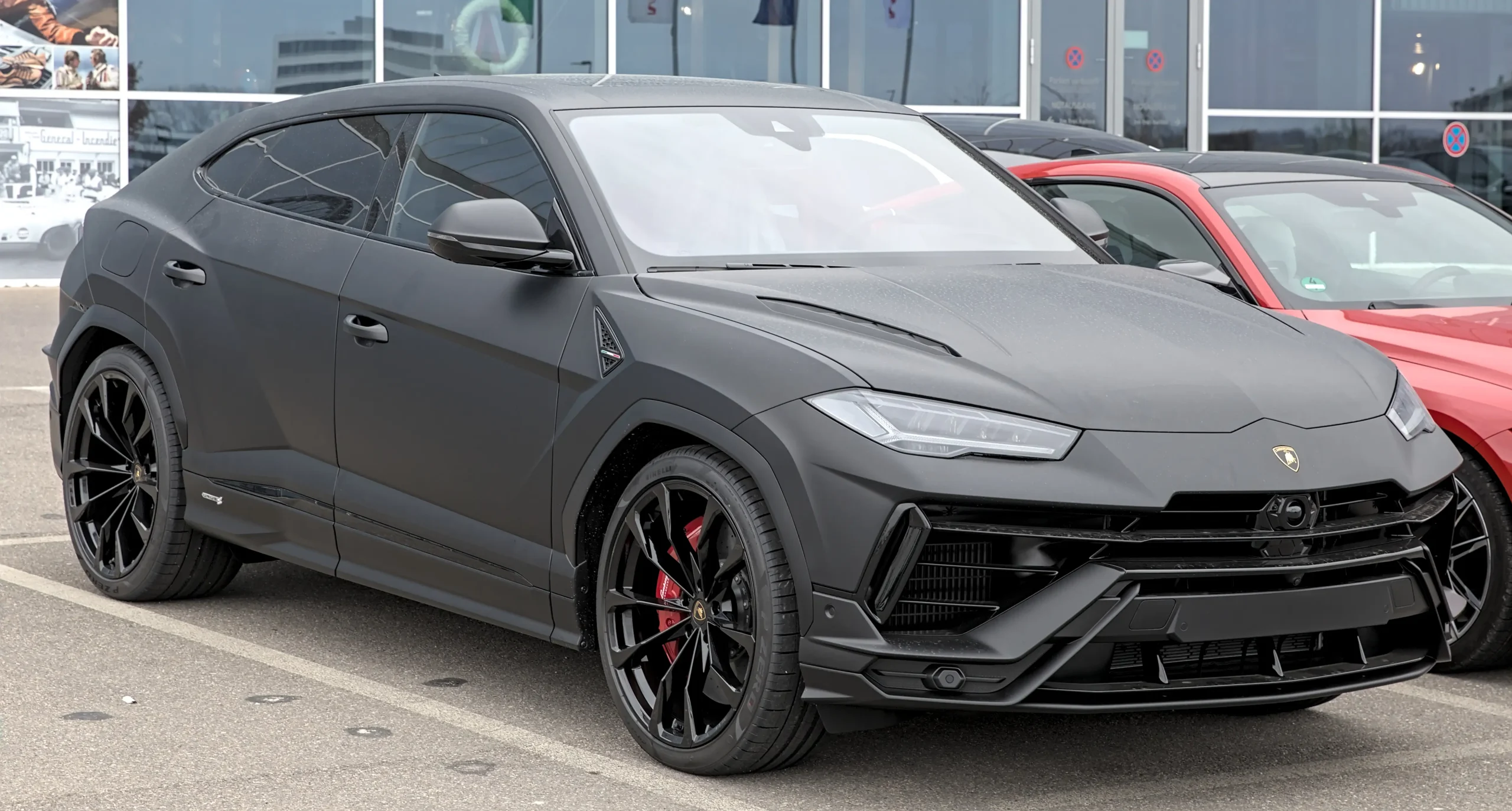 Sleek Lamborghini Urus SUV, powerful and luxurious, parked in a cityscape.