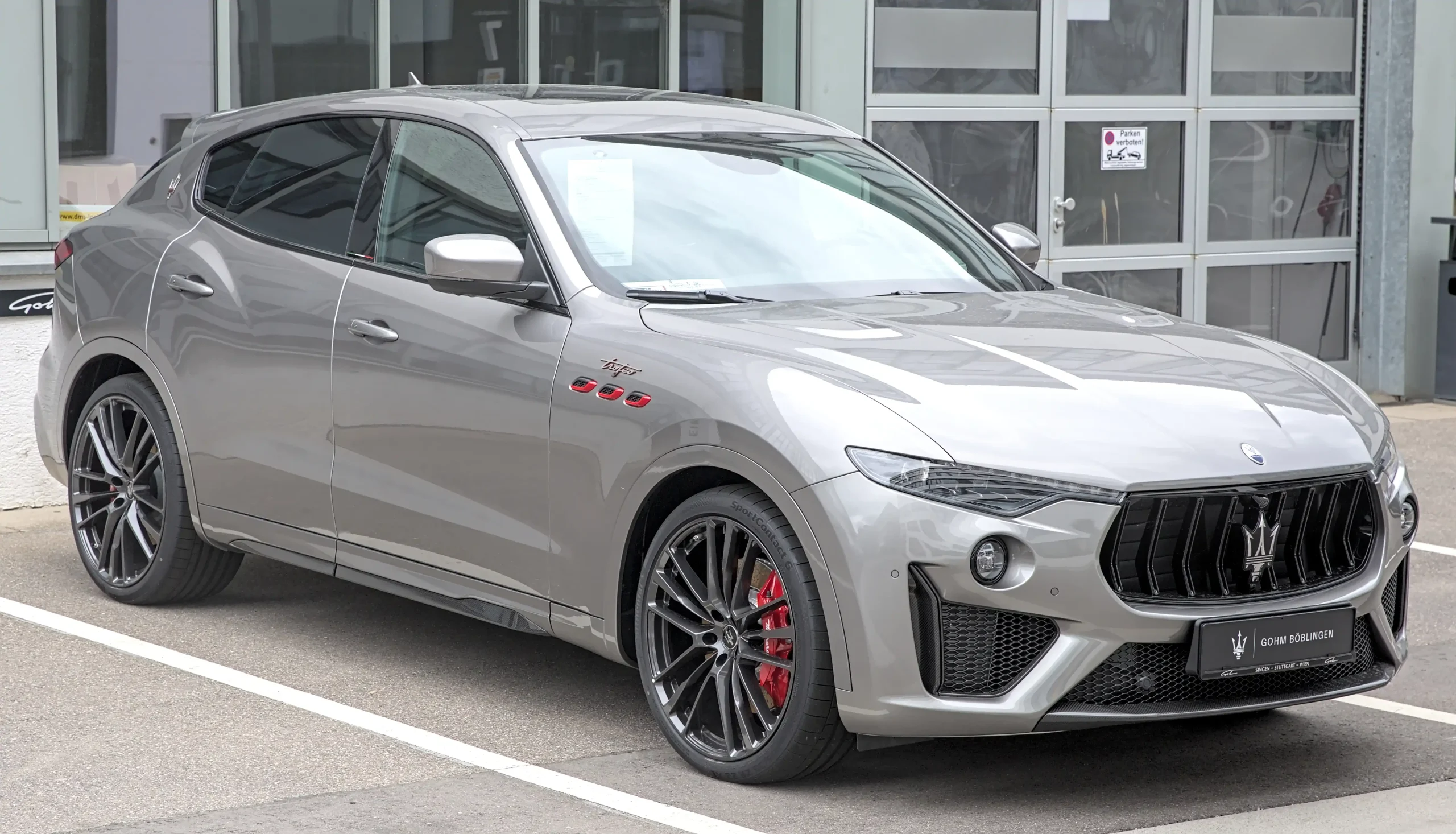 Red Maserati Levante Trofeo, powerful SUV with sleek design.