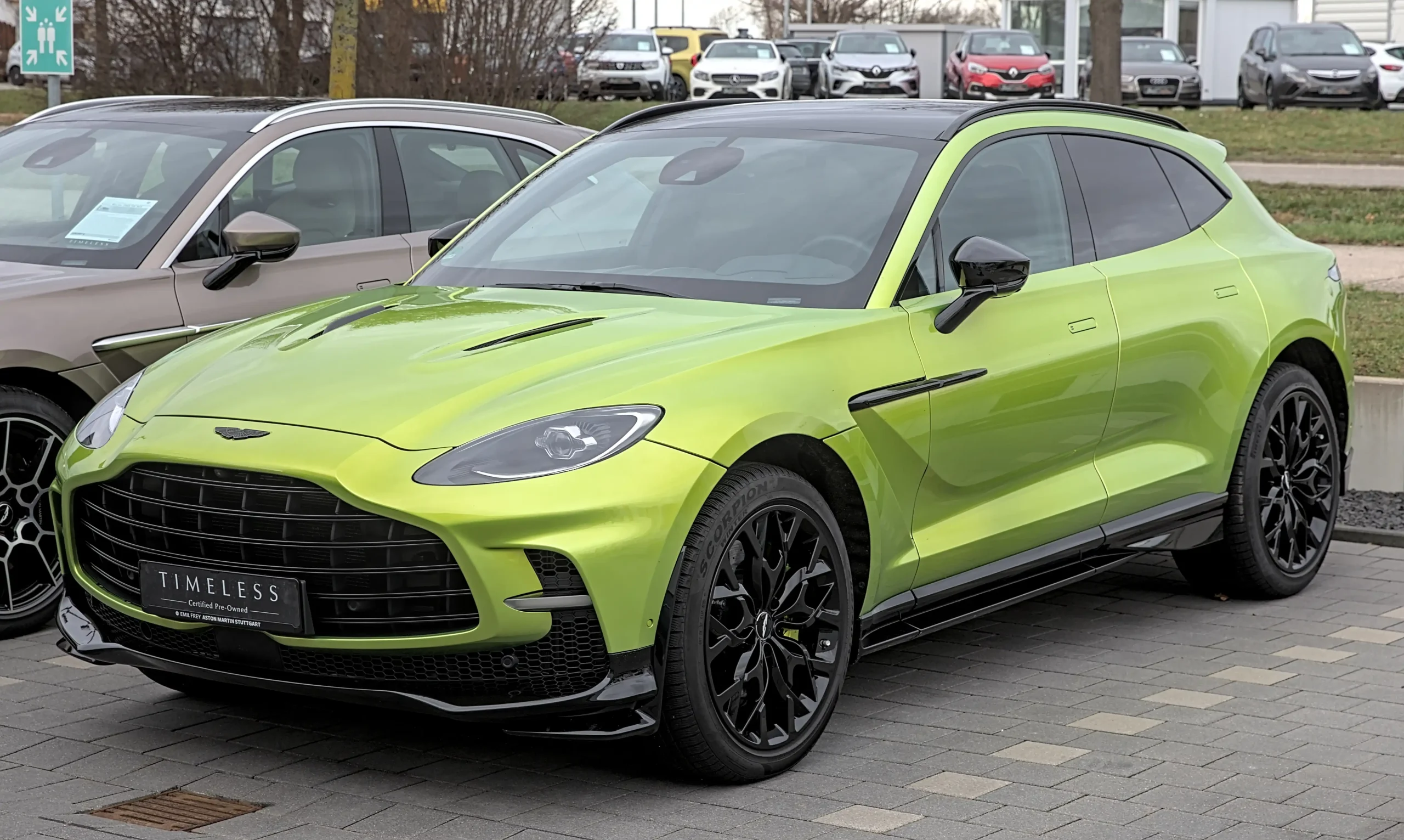 Red Aston Martin DBX707, powerful SUV with sleek design.