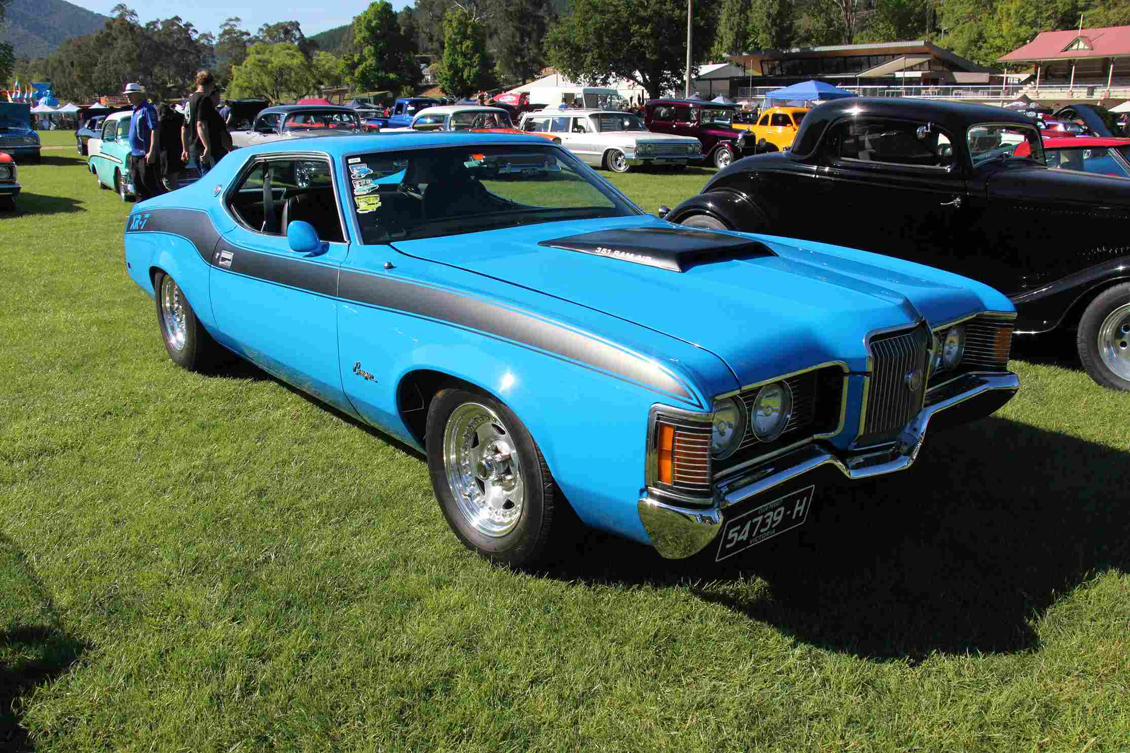 Red 1971 Mercury Cougar XR-7 Hardtop, classic American muscle car.