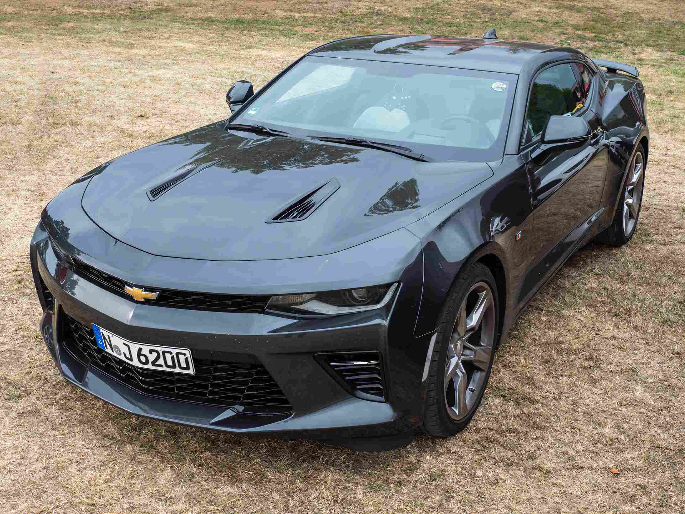 Silver fifth-generation Chevrolet Camaro parked in Leimershof.