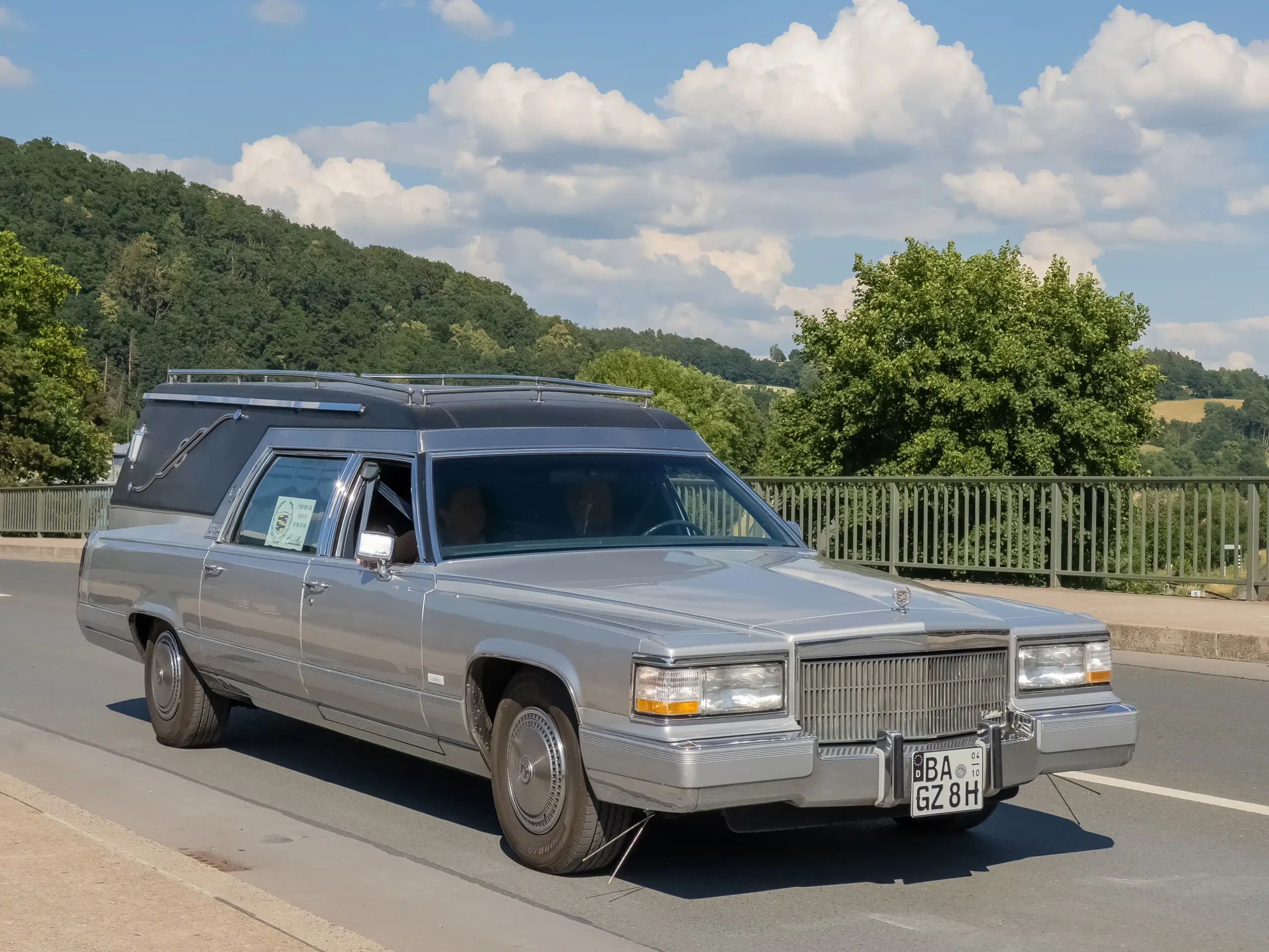 Classic Cadillac car, gleaming chrome details, vintage automotive elegance