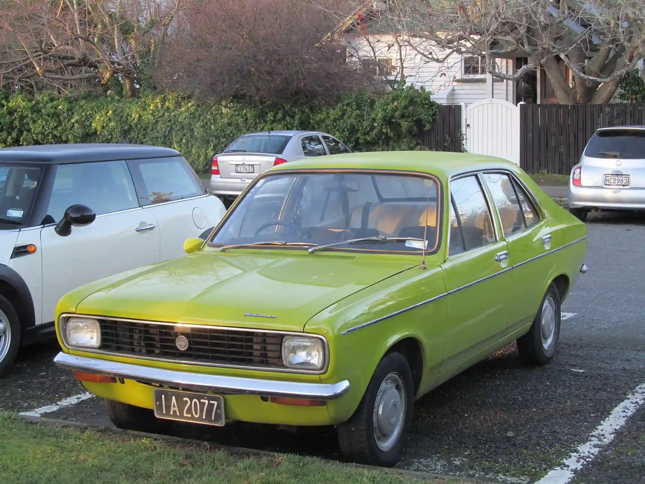 Classic Hillman Avenger, a British family car, parked on the street.