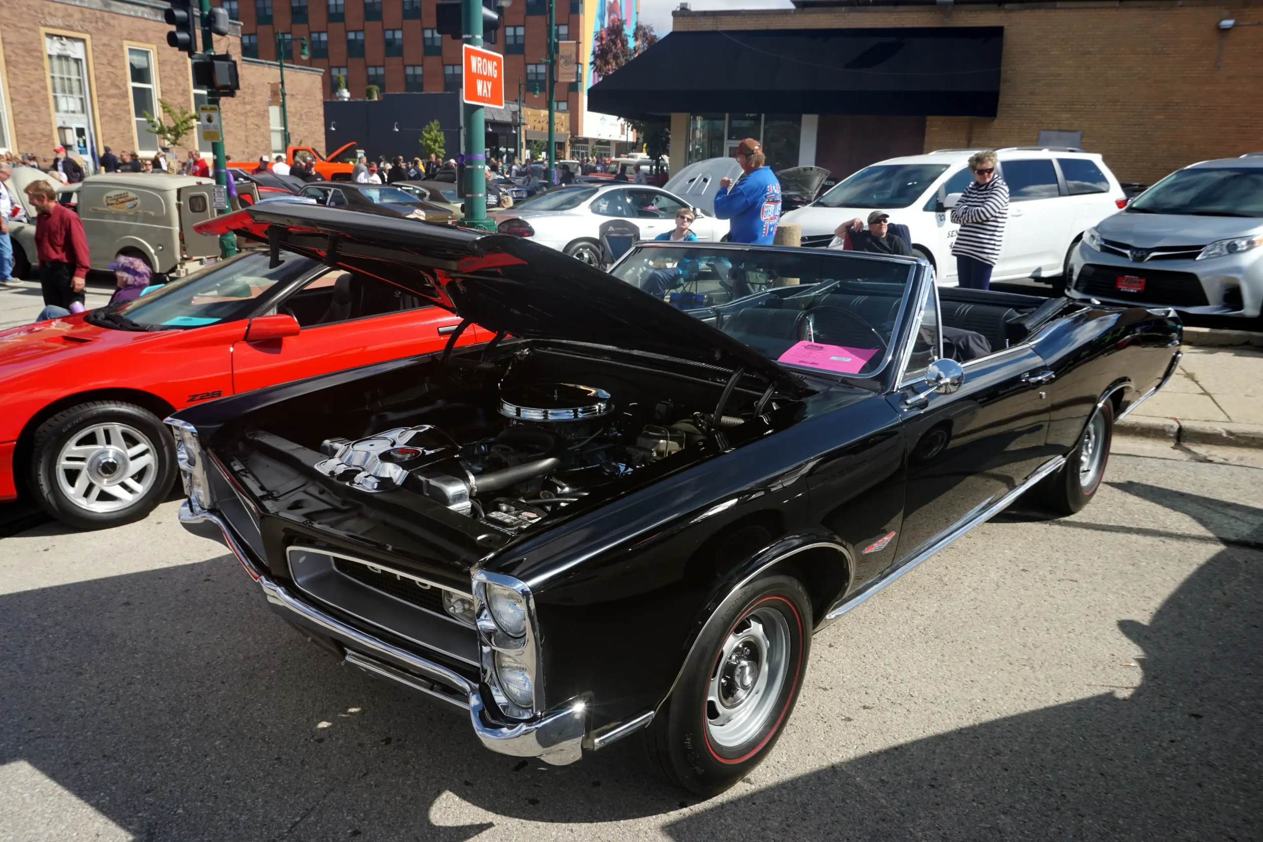 Classic red Pontiac GTO muscle car, a vintage American icon
