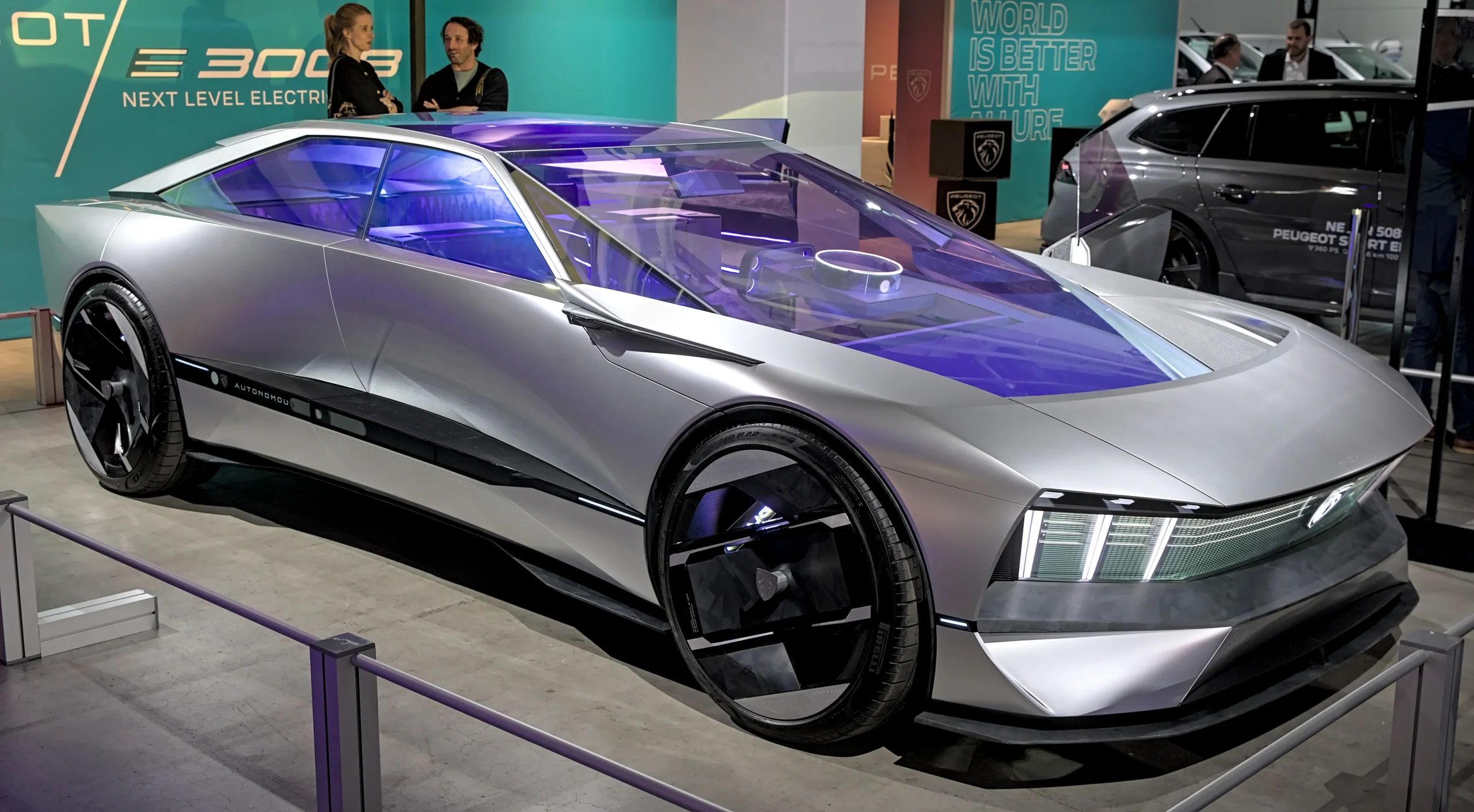 Sleek, futuristic Peugeot Inception concept car with sharp lines and luminous features