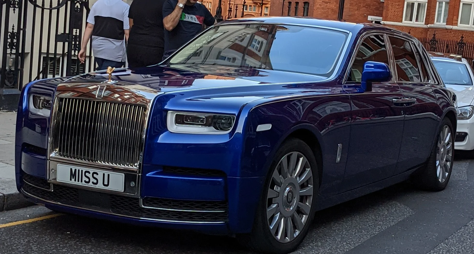 Luxurious 2019 Rolls Royce Phantom, parked, showcasing elegant design and power.