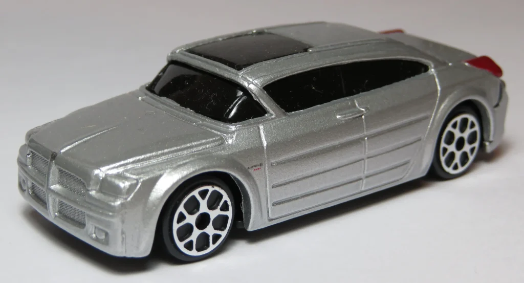 Sleek silver Dodge Super8 Hemi concept car on display, retro-futuristic design.