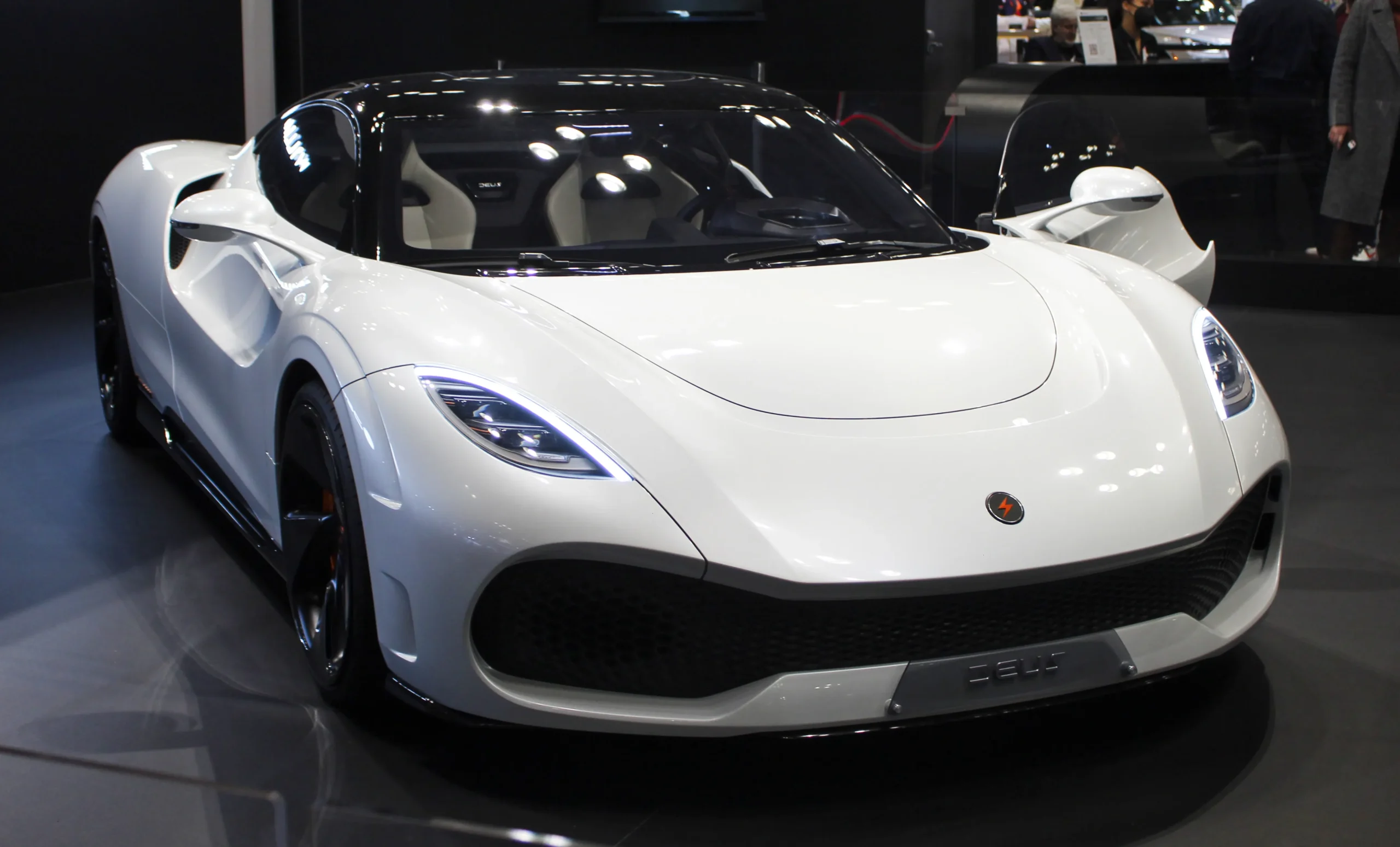 Sleek, electric Deus Vayanne hypercar showcasing futuristic design and