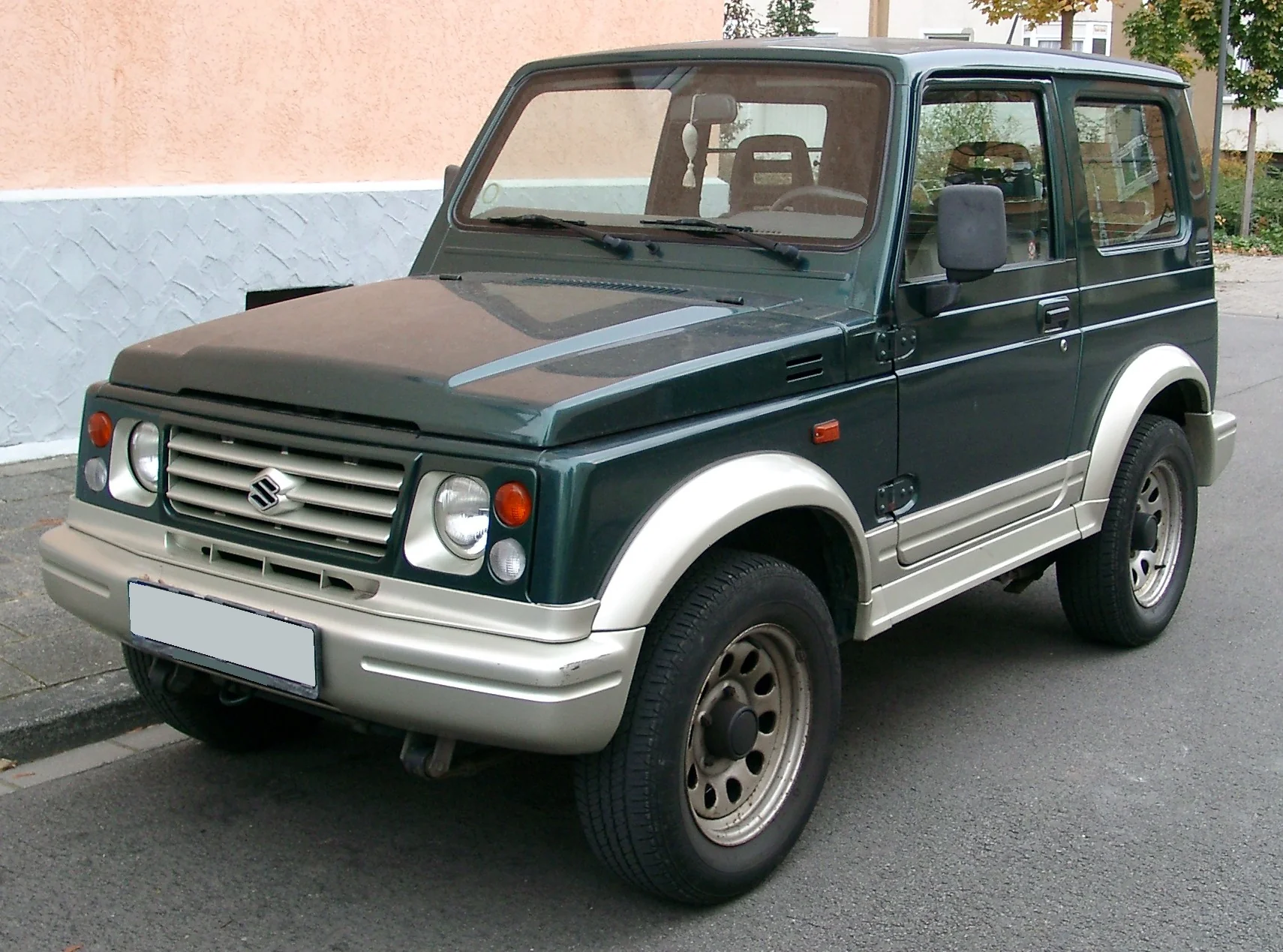 Front view of a classic Suzuki Samurai, off-road ready