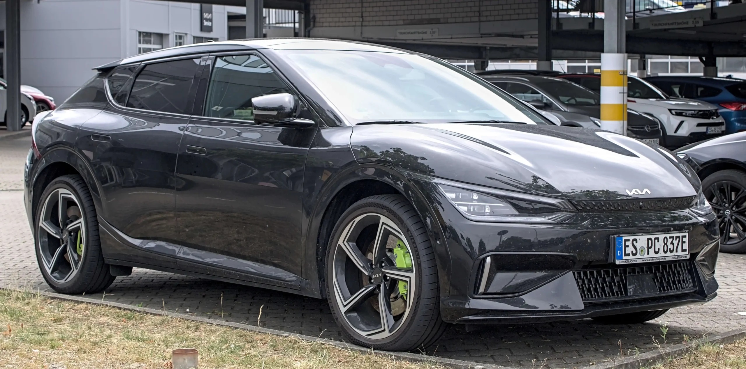 Sleek Kia EV6 electric vehicle on a modern street.