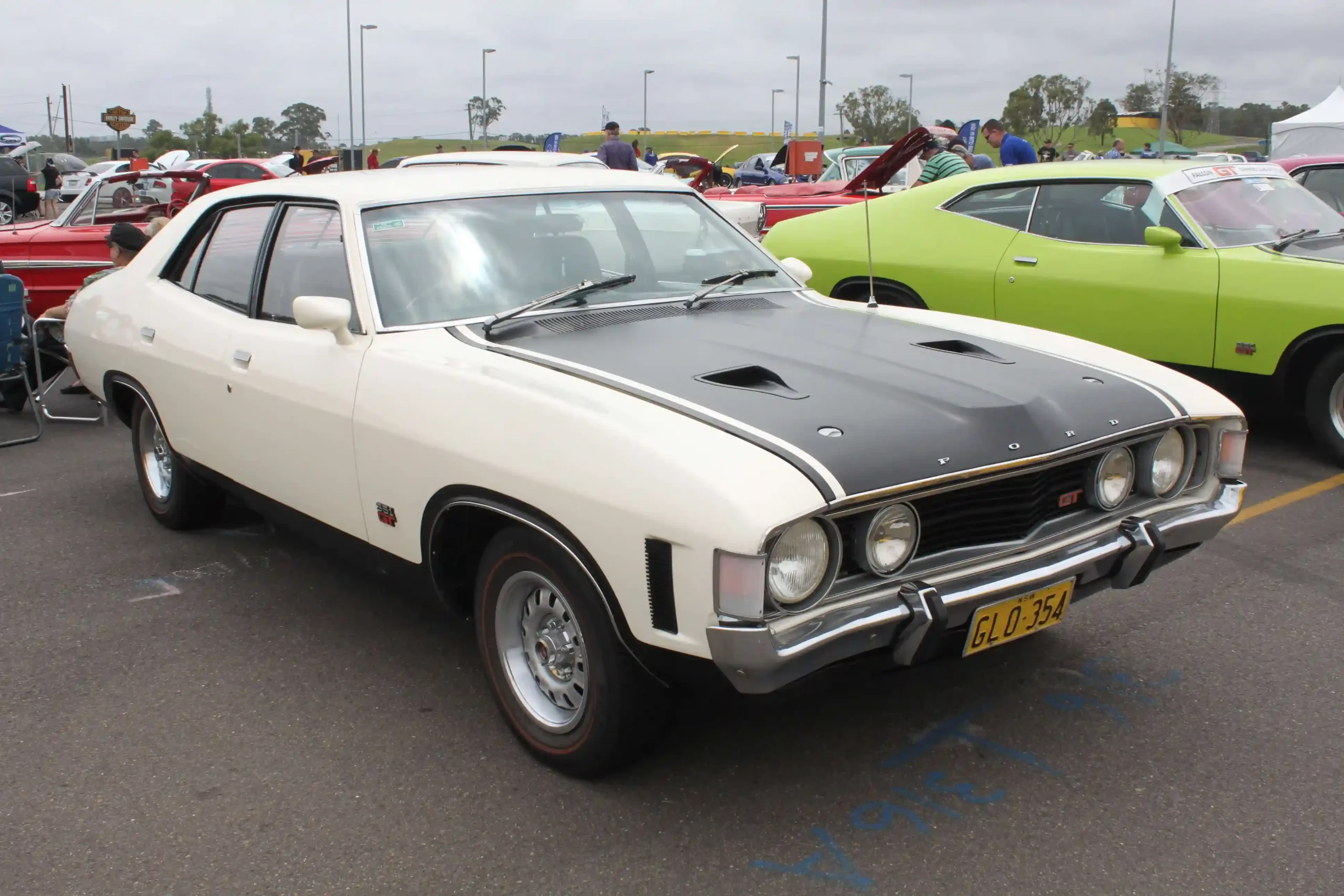 Classic Ford Falcon XA car, likely restored, gleaming in the sun.