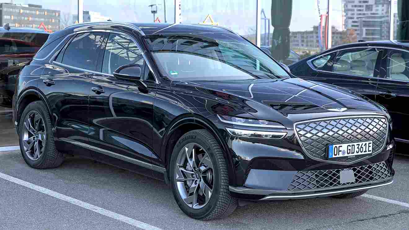 Sleek Genesis Electrified GV70 in a modern, urban setting