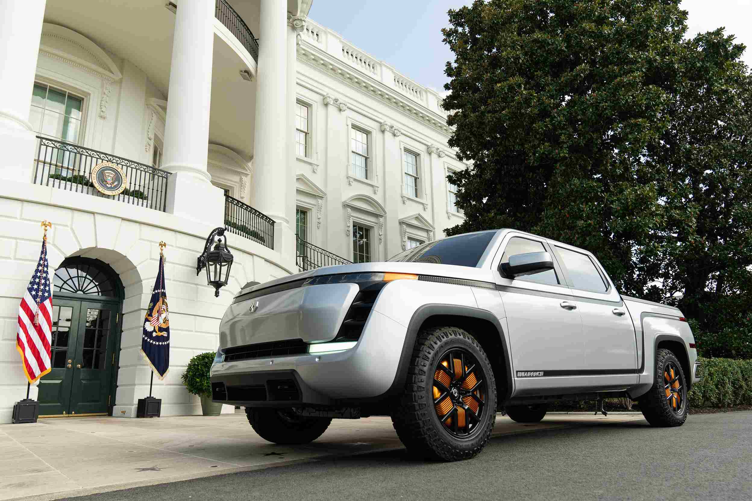 President Trump tours Lordstown Motors factory, inspecting electric pickup truck.