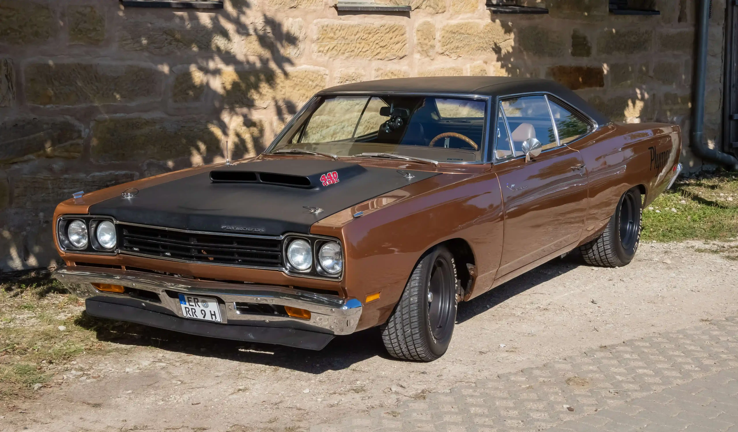 Classic 1968 Plymouth Road Runner, bright orange, powerful muscle