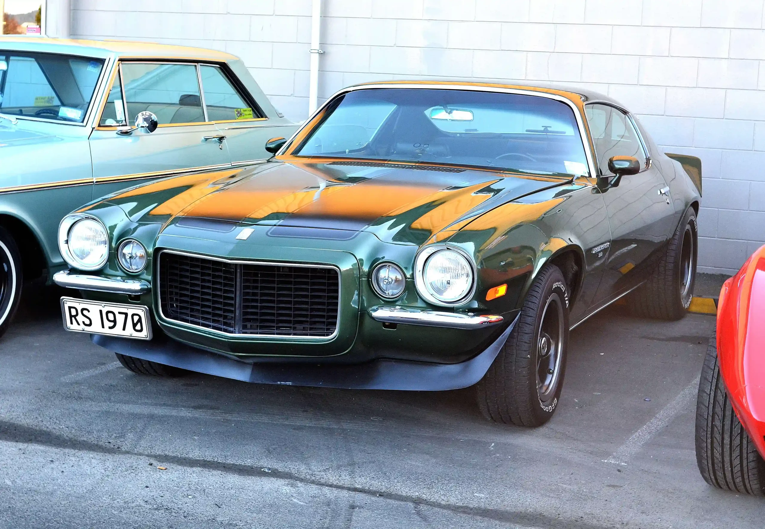 Classic 1970 Chevrolet Camaro muscle car, parked and gleaming in