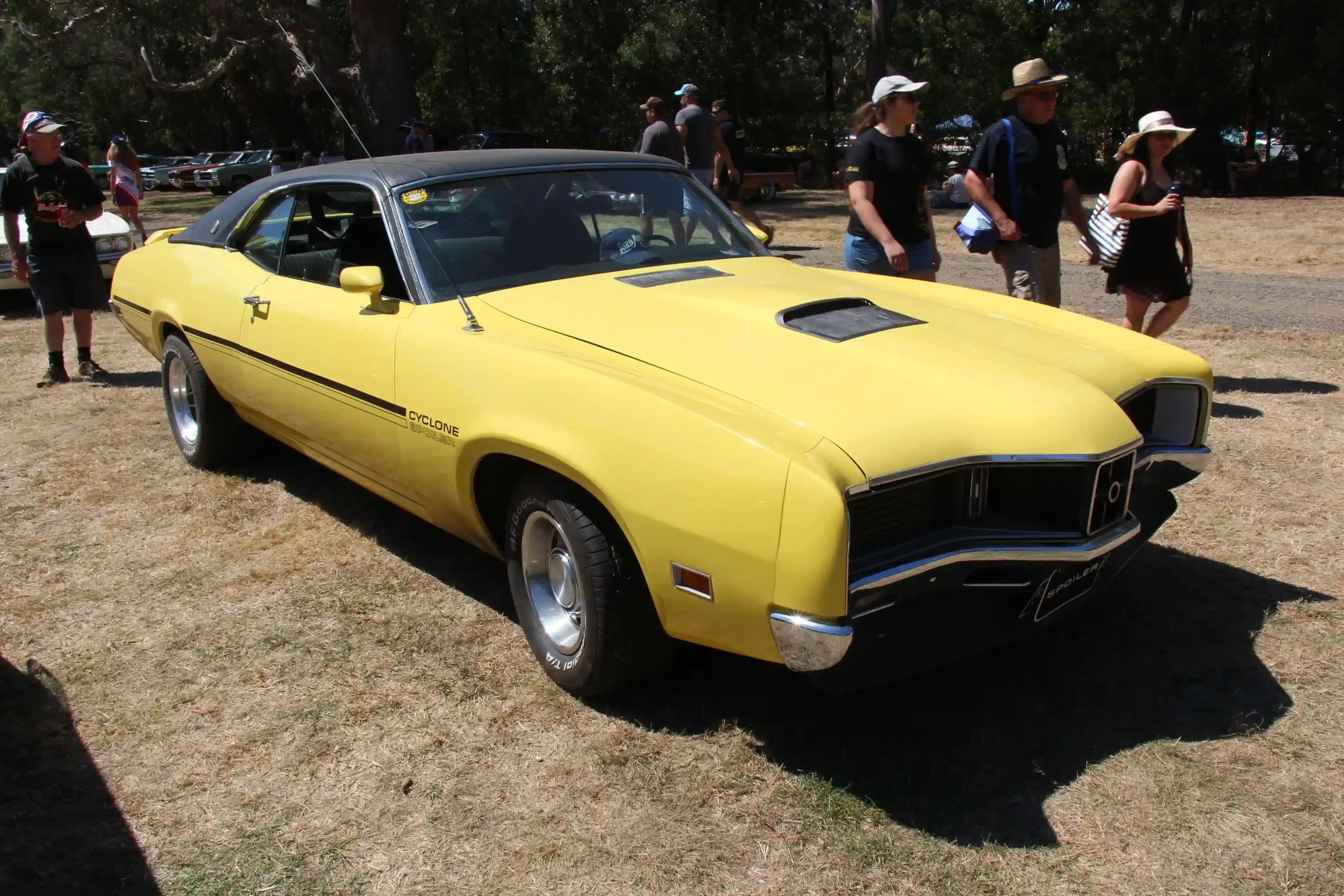 Bright orange 1970 Mercury Cyclone Spoiler muscle car, side view