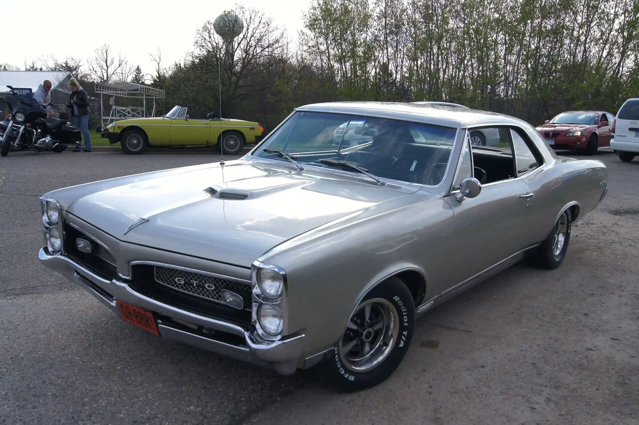 Classic 1967 Pontiac GTO, iconic muscle car, gleaming