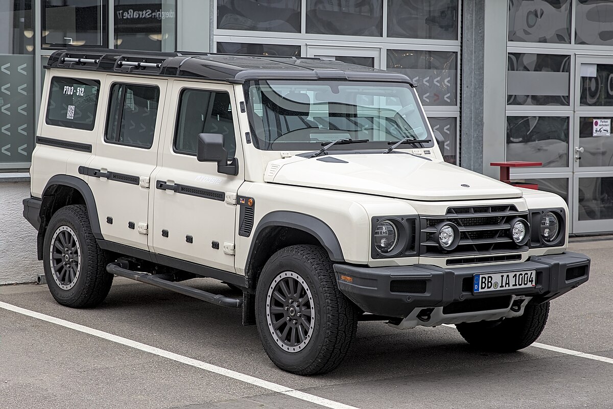 The Ineos Grenadier is a rugged, no-nonsense off-road SUV, designed for serious adventure, with a focus on durability, advanced 4x4 capabilities, and a classic, utilitarian design.