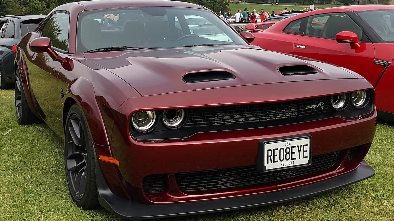 2019 Dodge Challenger Hellcat Redeye Widebody with custom "REDEYE" license plate at outdoor car show