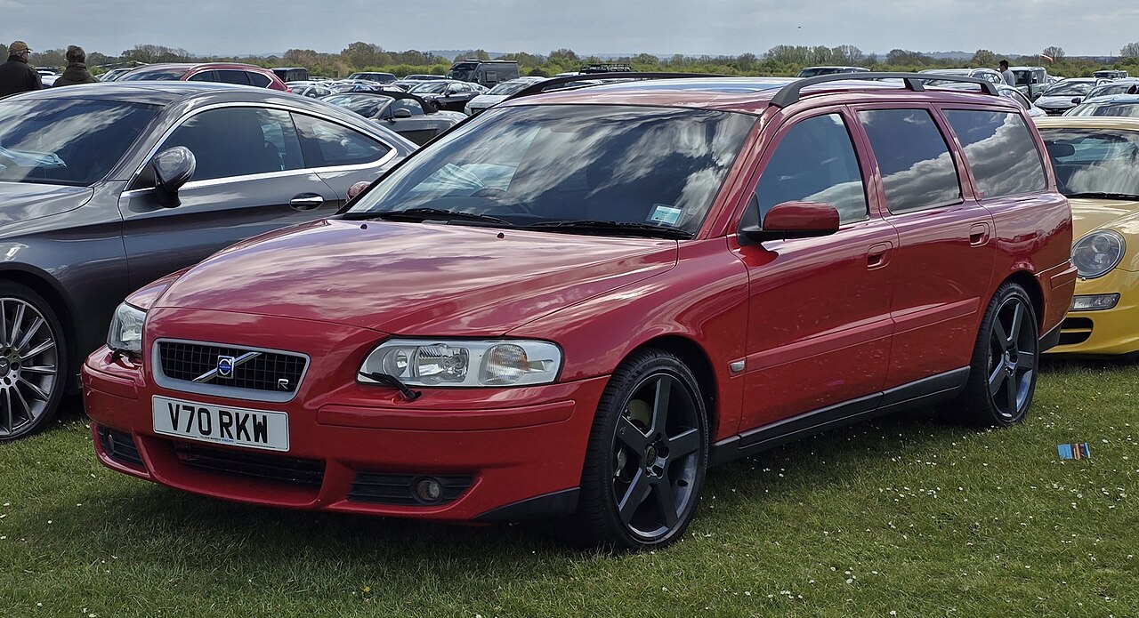 Red 2004 Volvo V70 R station wagon with black wheels and UK license plate V70 RKM at car show