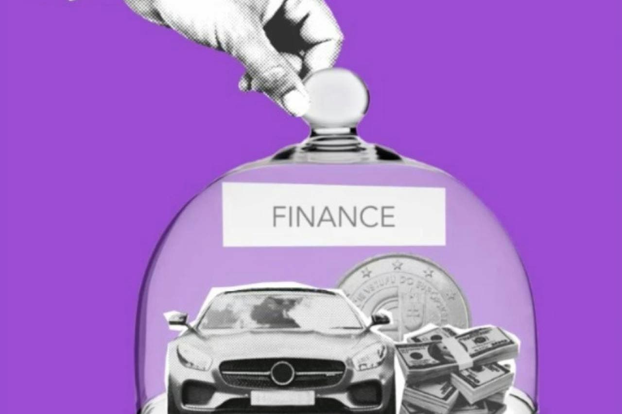 Hand placing coin into glass jar labeled "FINANCE" containing car, money stacks, and coin on purple background