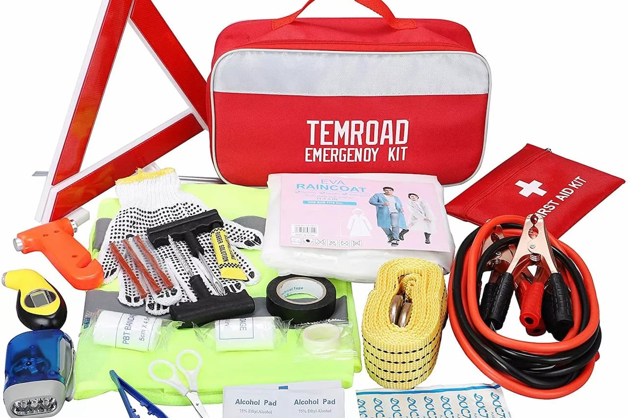 Temroad emergency kit with reflective triangle, jumper cables, first aid supplies, flashlight, and safety gear