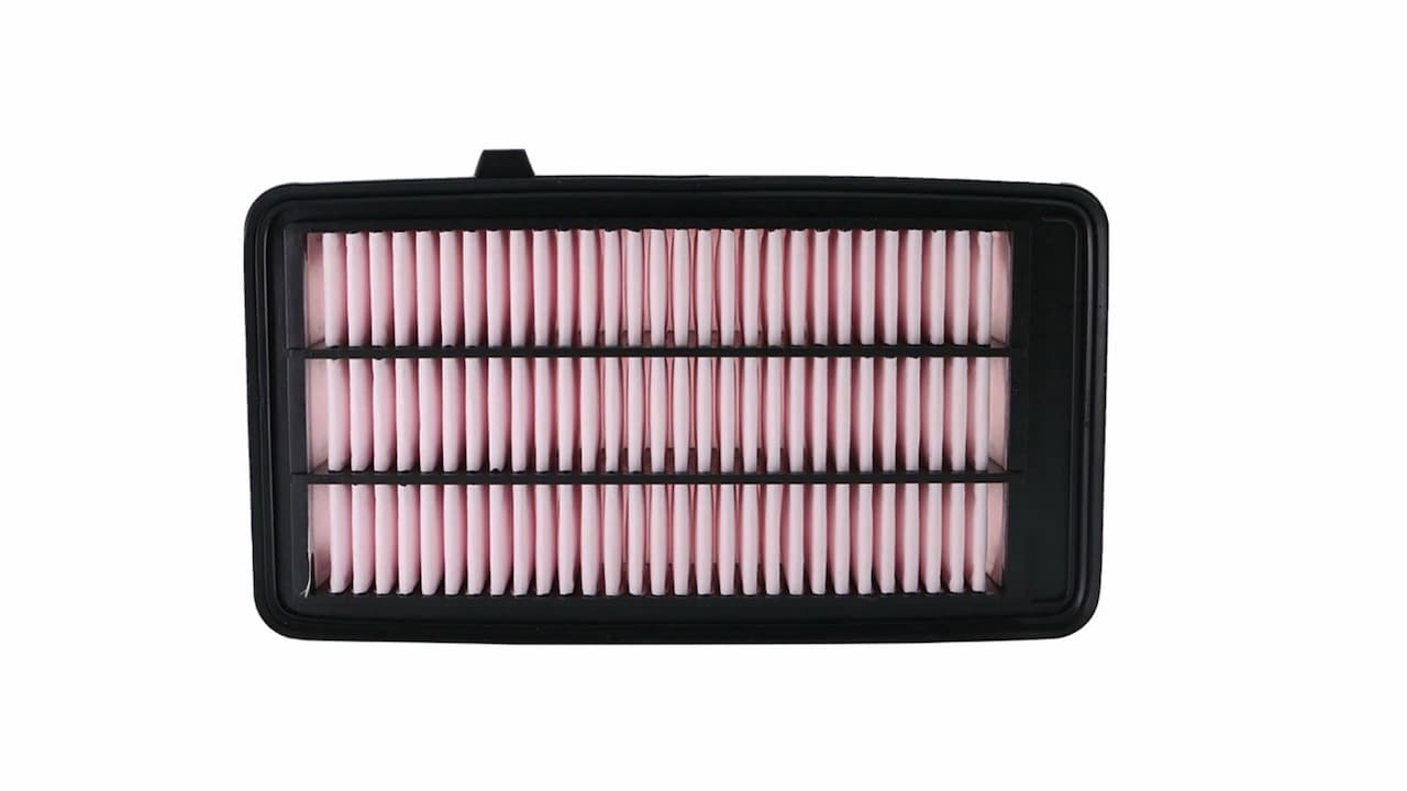 Clean rectangular car air filter with pink pleated filter media in black plastic frame on white background