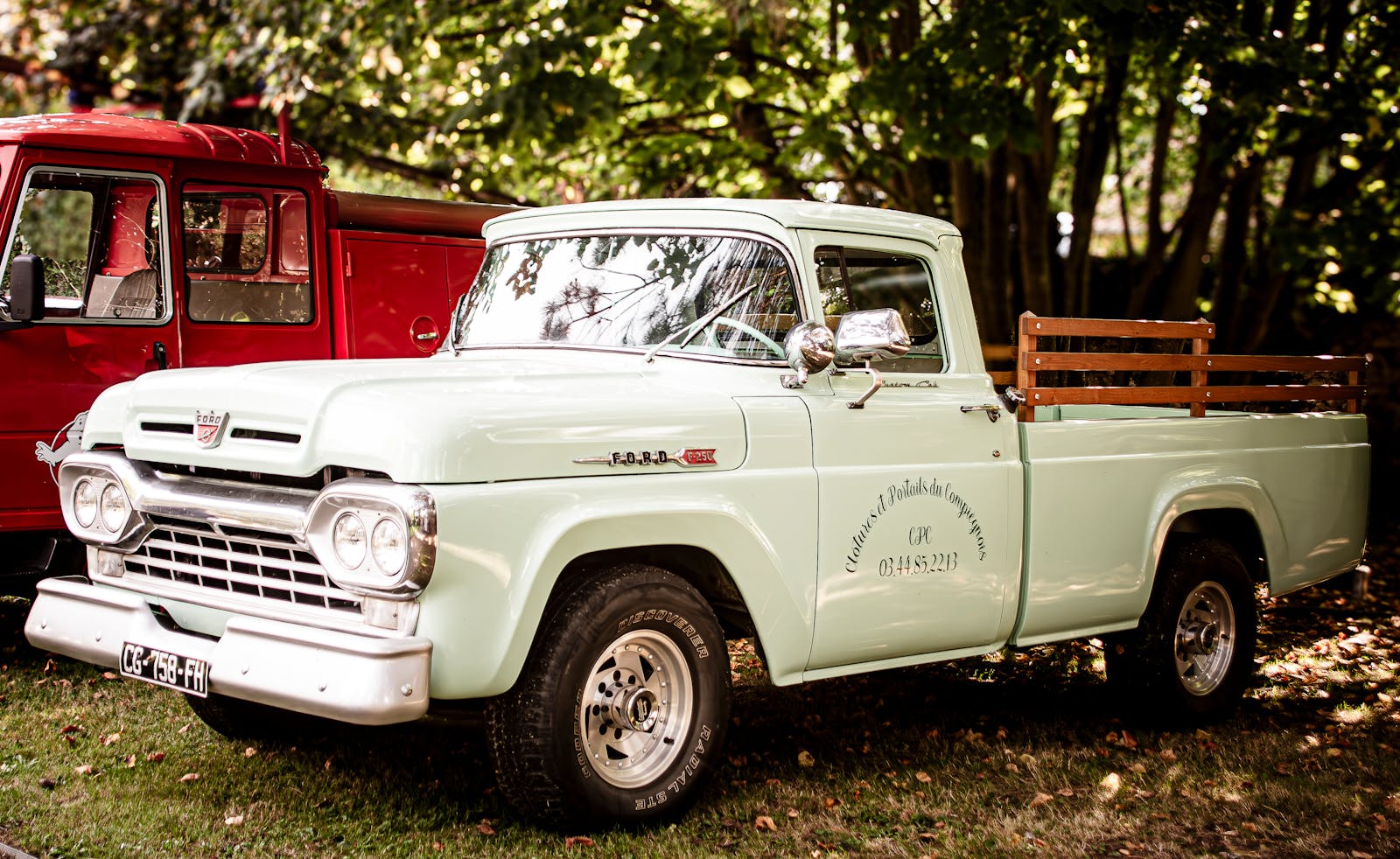 Classic Ford F-Series pickup truck parked outdoors, showcasing retro design and vintage style.
