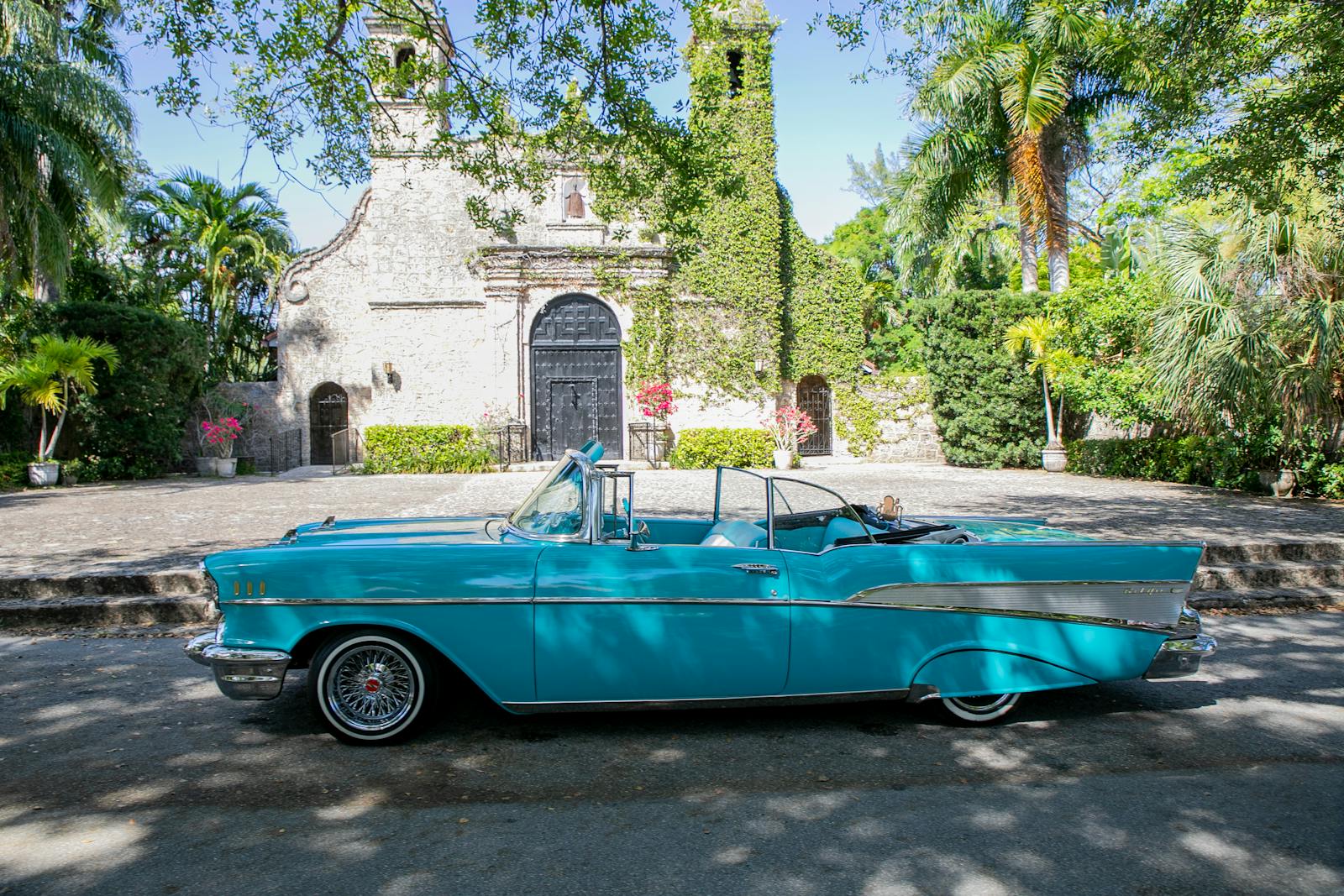 A vintage Chevrolet Bel Air parked in sunny Havana, Cuba, showcasing iconic retro style.