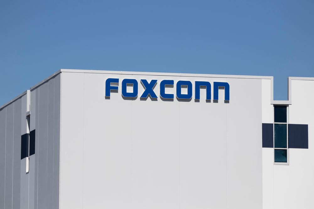 Foxconn to Spend Up to $3 Billion a Year on AI, Chair Sees China EV Shake-Out