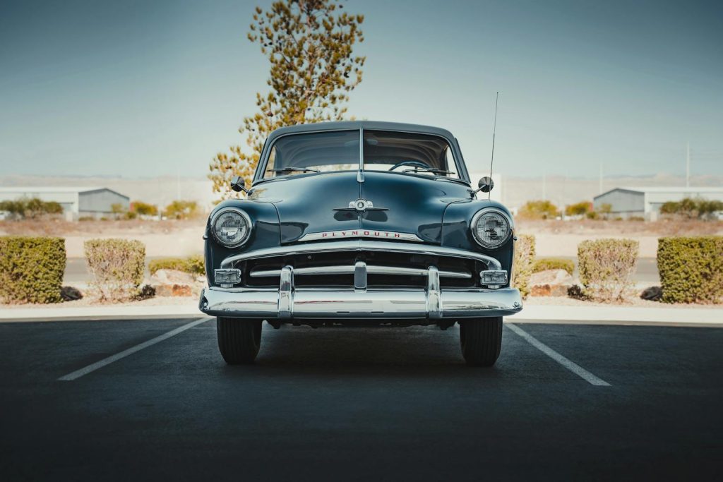 A classic Plymouth car parked outdoors in Las Vegas, Nevada on a sunny day.