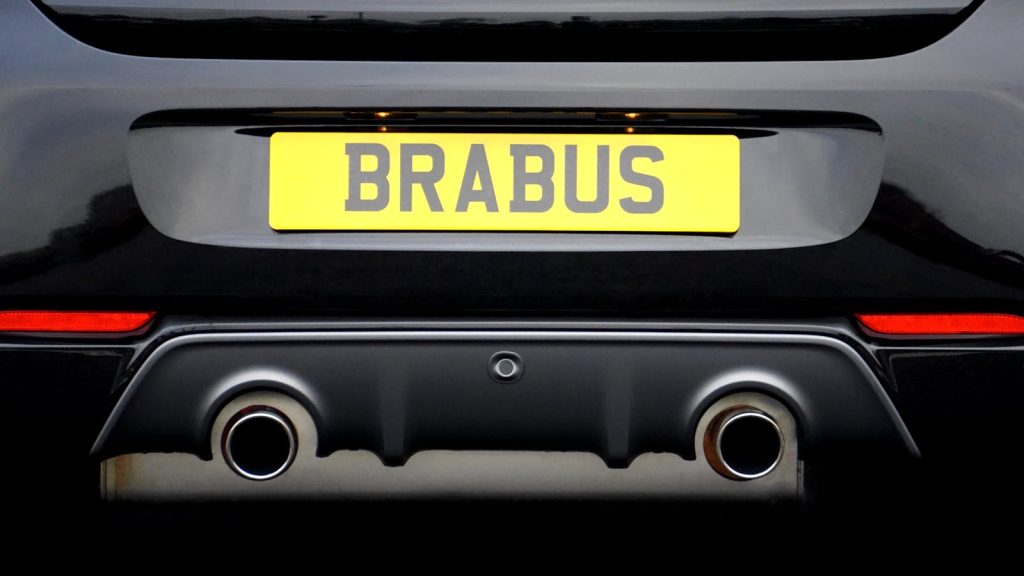 Close-up of a Brabus car rear showcasing its exhaust and license plate.