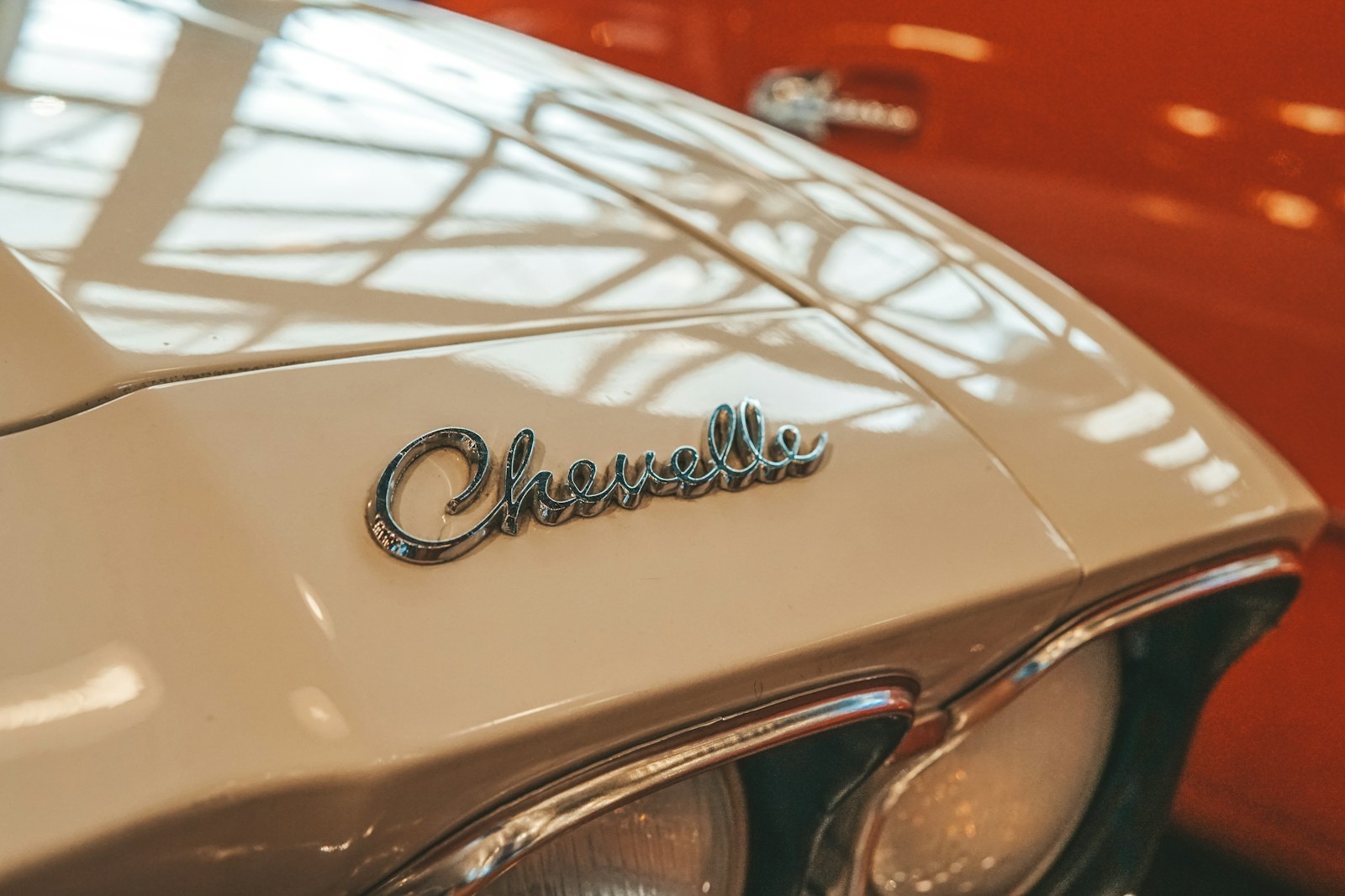 a close up of the front of a classic car