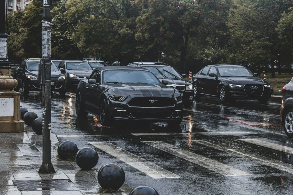 a bunch of cars that are sitting in the street