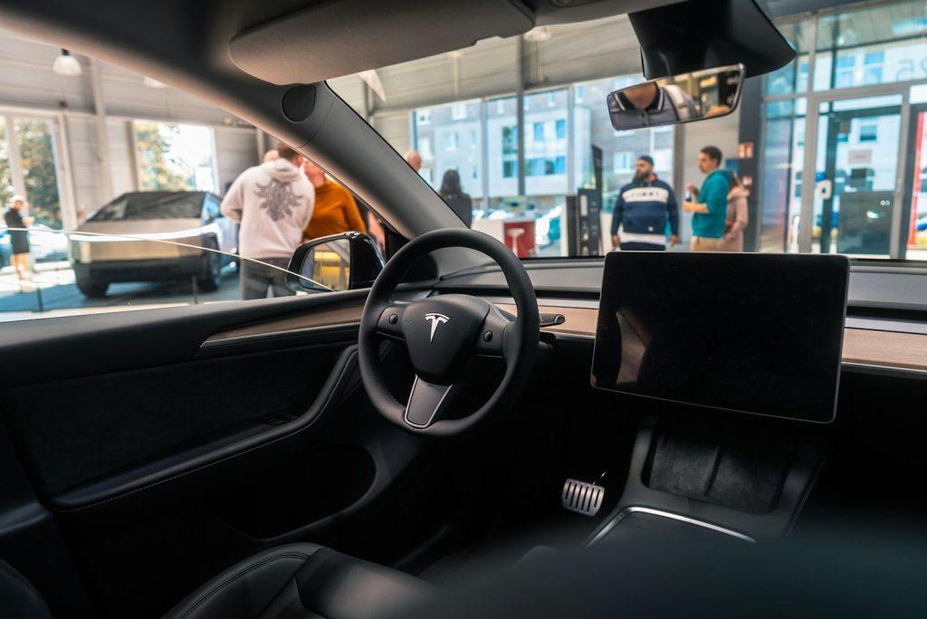 A view of the inside of a car from the driver's seat