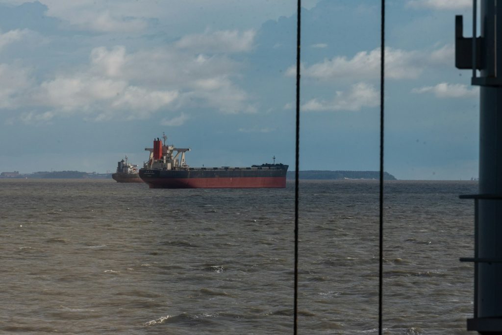 a large ship in the middle of a body of water