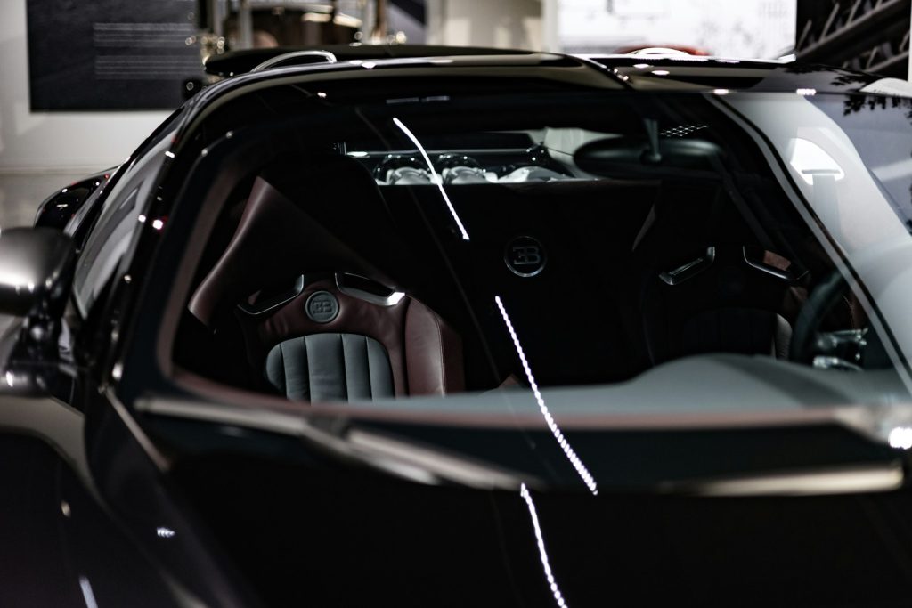 a black sports car parked in a garage