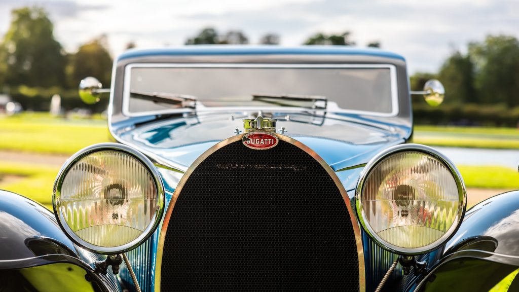 A close-up of a classic blue bugatti.