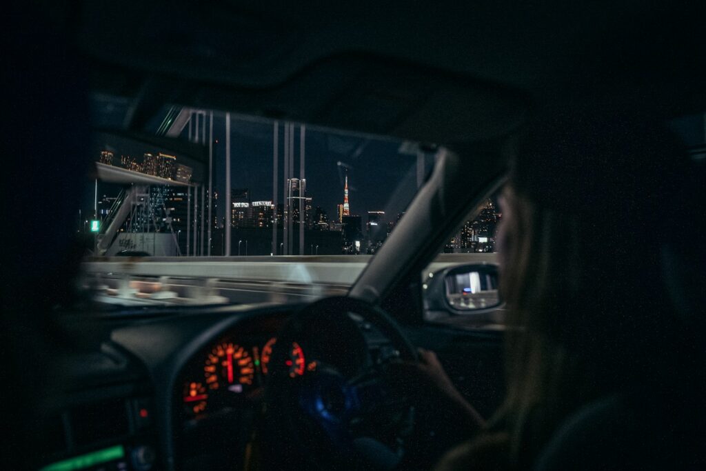 Driving through a city at night