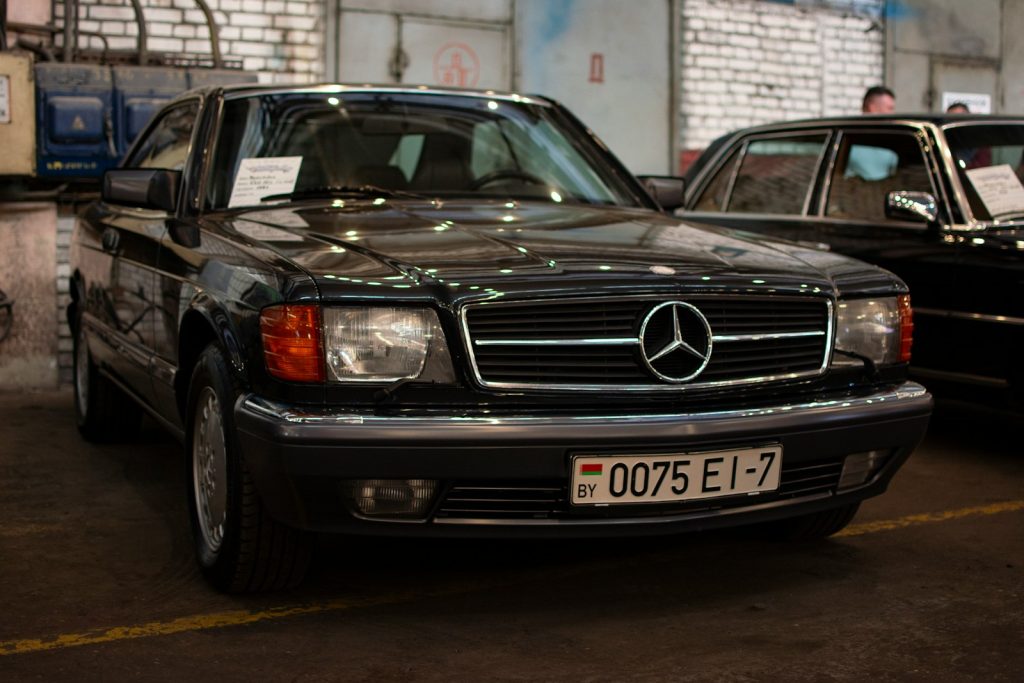 a black car parked in a parking lot
